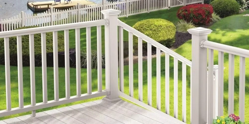 A vinyl railing on a residential deck. The selling point of this material is not how it looks on day one-it is how it looks on year ten without a single hour of sanding or painting in between.